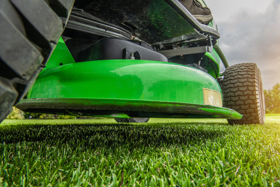 Backyard Garden Field Mowing Using Riding Tractor Grass Mower